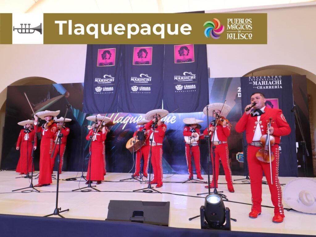 Encuentro Internacional del Mariachi y la Charrería 2026: Sedes 6 Gala de mariachi en trajes de charro rojo interpretando música mexicana en el escenario cultural del Pueblo Mágico de San Pedro Tlaquepaque.